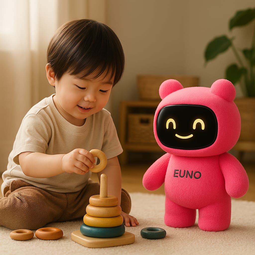 Enfant qui joue avec le robot Euno rouge